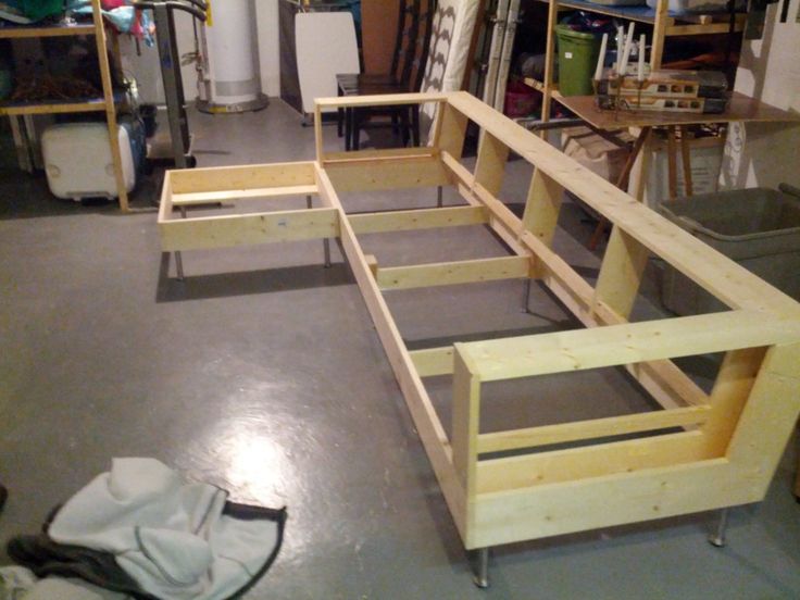 the unfinished bed frame is ready to be assembled