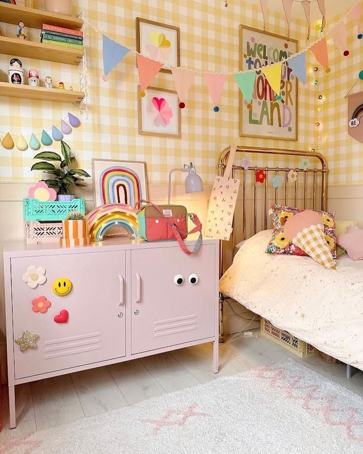 a child's bedroom decorated in pastel colors