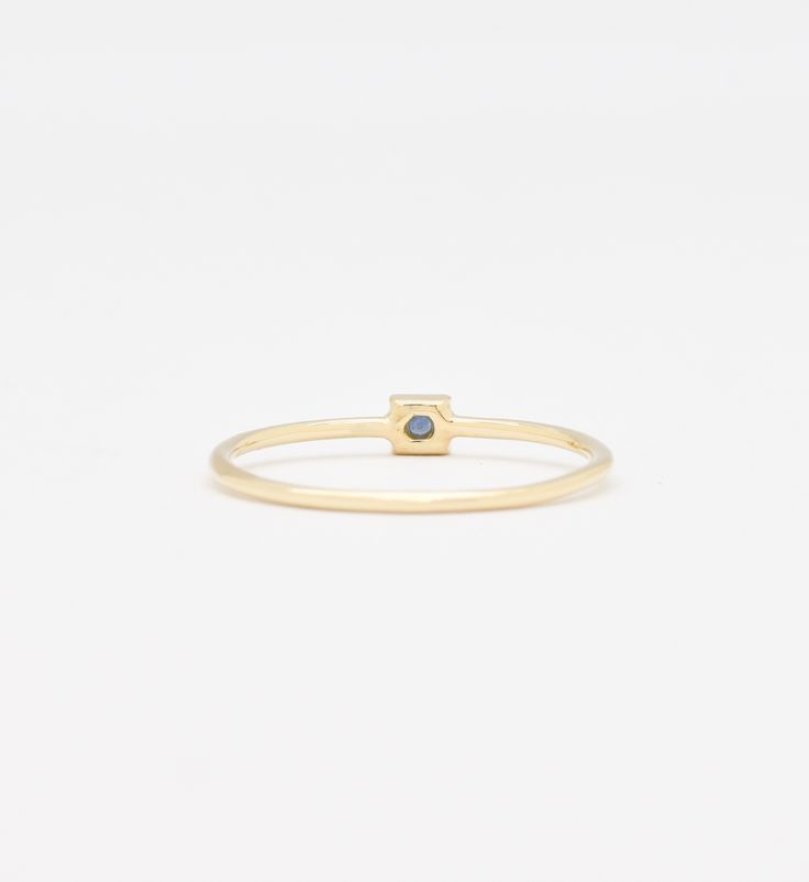 Dainty Sapphire Gold Ring set with Genuine Sapphire, size 2 millimetres diameter, 0.03 Carats.Solid 14k Yellow Gold ☞ made to last.Click here for ☞ Solid Gold CollectionSapphire Details:• CERTIFIED Genuine Sapphire • Weight: 0.03 Carats• Dimensions: 2mm• Color: Blue• Cut: Diamond• Origin: BurmaSolid Gold Details:• 0.80 grams of 14k Solid Yellow Gold• Dimensions: Band width ≈ 1mm, thickness ≈ 1mm• Lasts a lifetime - Perfect for everyday use (won’t tarnish)*Final weight & dimensions depending on the chosen ring sizeSKU YR-1004 Stackable Sapphire Ring In Yellow Gold, Minimalist Round Sapphire Ring In 14k Gold, Minimalist 14k Gold Round Sapphire Ring, Dainty 14k Yellow Gold Sapphire Ring, Minimalist 14k Yellow Gold Sapphire Ring, Minimalist Yellow Gold Sapphire Ring, Stackable Yellow Gold Sapphire Ring, 14k Yellow Gold Birthstone Rings, Minimalist Gold Sapphire Ring In 14k Gold