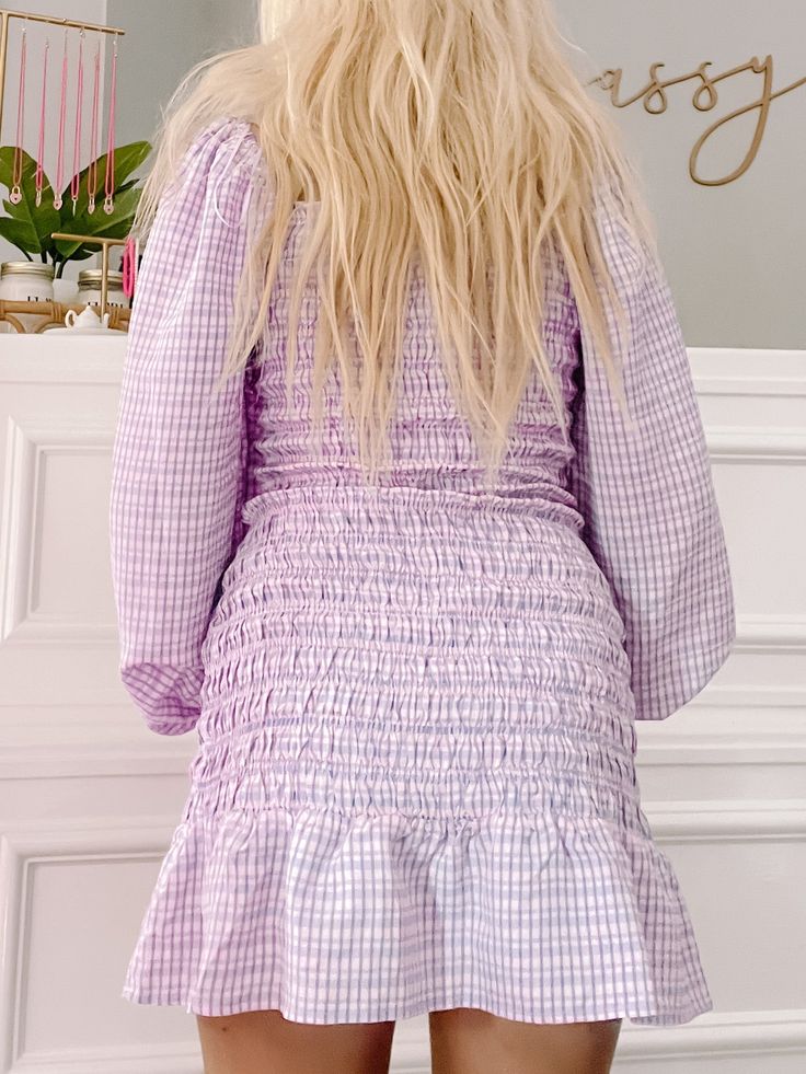 Meet the Rock the Smock Dress from Sassy Shortcake! This long sleeve preppy dress features a playful plaid pattern, plus a smocked bodice and ruffle hem for all the extra flounce! fit: true to size, model wearing a size small care: hand wash cold Preppy Long Sleeve Spring Dresses, Fitted Smocked Dress With Tiered Skirt And Smocked Cuffs, Fitted Smocked Dress With Tiered Skirt, Daywear Smocked Mini Dress With Ruffle Hem, Long Sleeve Smocked Top For Day Out, Mini Smocked Dress With Smocked Cuffs For Brunch, Long Sleeve Smocked Top With Ruffles For Brunch, Mini Smocked Dress With Cuffs For Brunch, Long Sleeve Smocked Top For Brunch