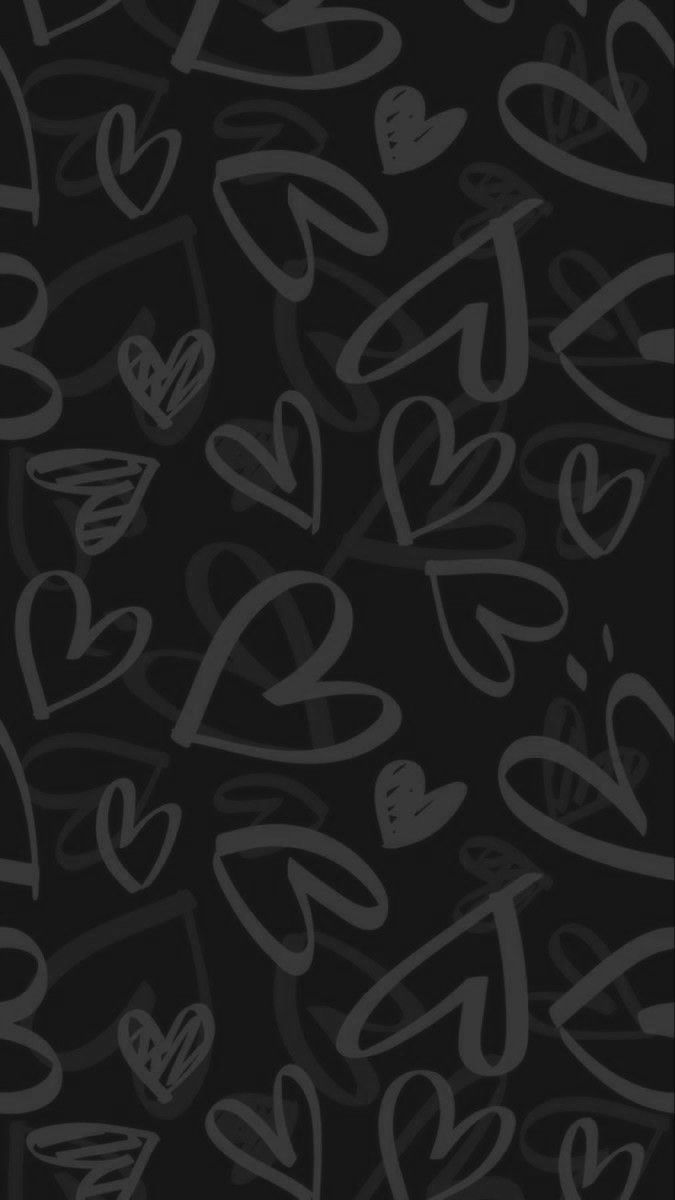 black and white hearts on a black background