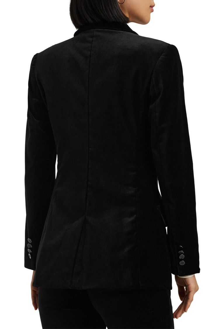 This sharply tailored blazer is ready for your next occasion thanks to soft velour composition and classic peaked lapels. Front button closure Peaked lapels Four-button cuffs Chest welt pocket Front flap pockets Back vent Lined 98% cotton, 2% elastane Machine wash, tumble dry Imported Velvet Tuxedo Suit, Classic Velvet Outerwear For Business, Velvet Tuxedo Suit For Workwear, Classic Velvet Business Outerwear, Business Velvet Outerwear With Lapel Collar, Business Velvet Outerwear With Suit Collar, Tailored Velvet Outerwear For Business, Velvet Single Button Outerwear For Work, Single Button Velvet Outerwear For Work