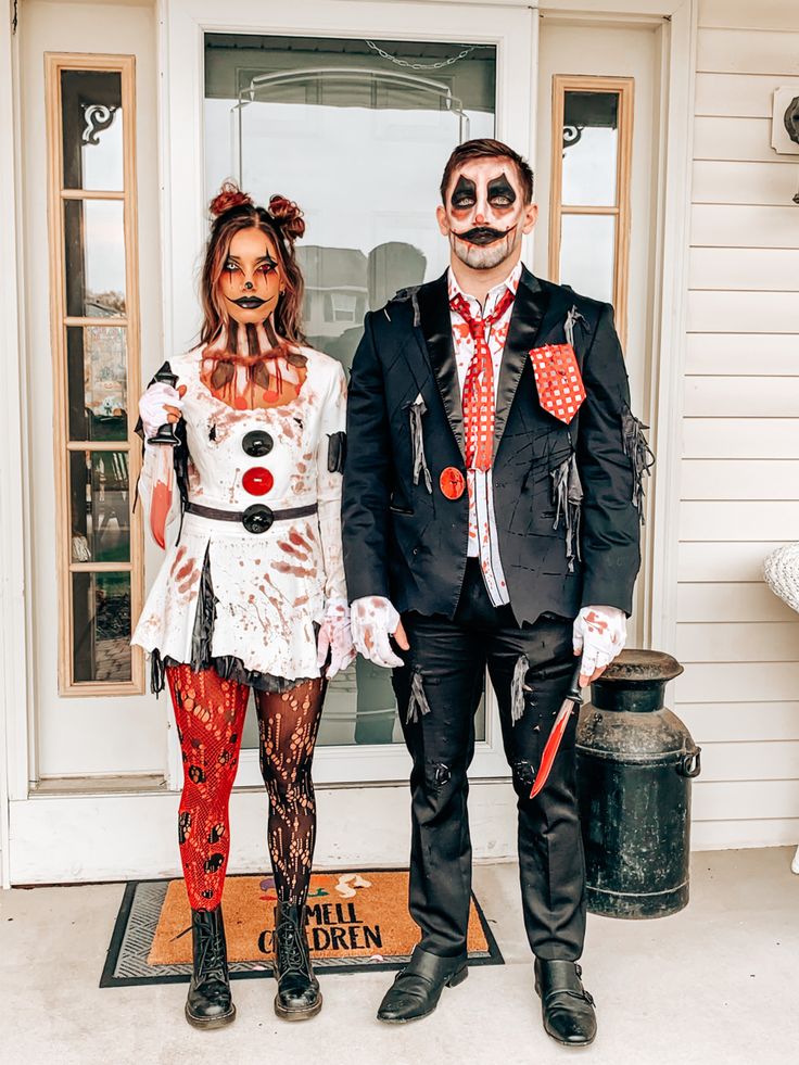 two people dressed up in costumes for halloween