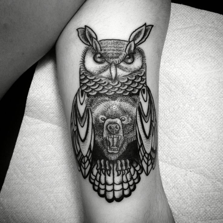 an owl and bear tattoo on the leg