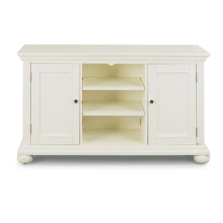 the sideboard is white and has shelves on both sides, as well as two doors