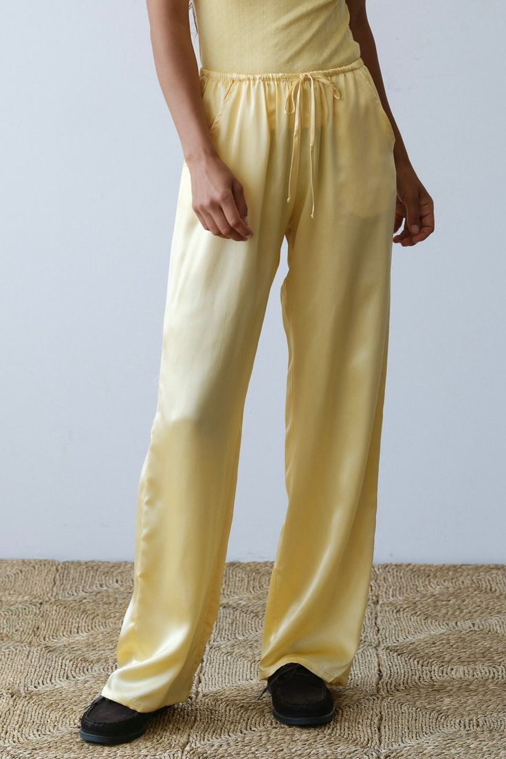 The Silk Drawstring Pant is crafted from our luxe 100% silk charmeuse fabric. Featuring a drawstring waist, pockets, straight-leg, and relaxed fit. Made in Los Angeles Upcycled Tote, Charmeuse Fabric, Los Angeles Shopping, Spring Fabric, Silk Organza, Silk Charmeuse, Polar Fleece, Drawstring Pants, Cropped Pants