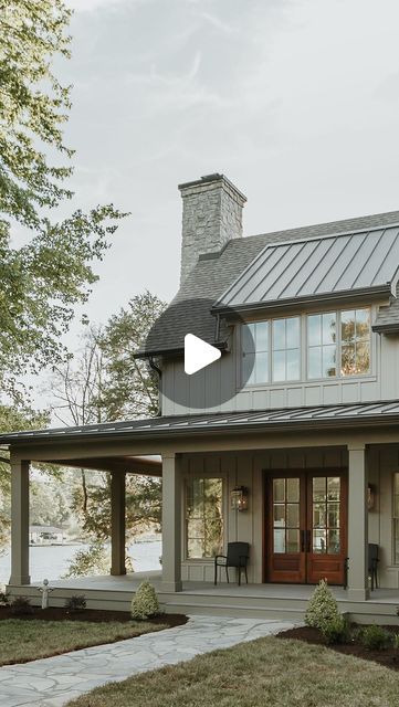 a house with a metal roof and porch