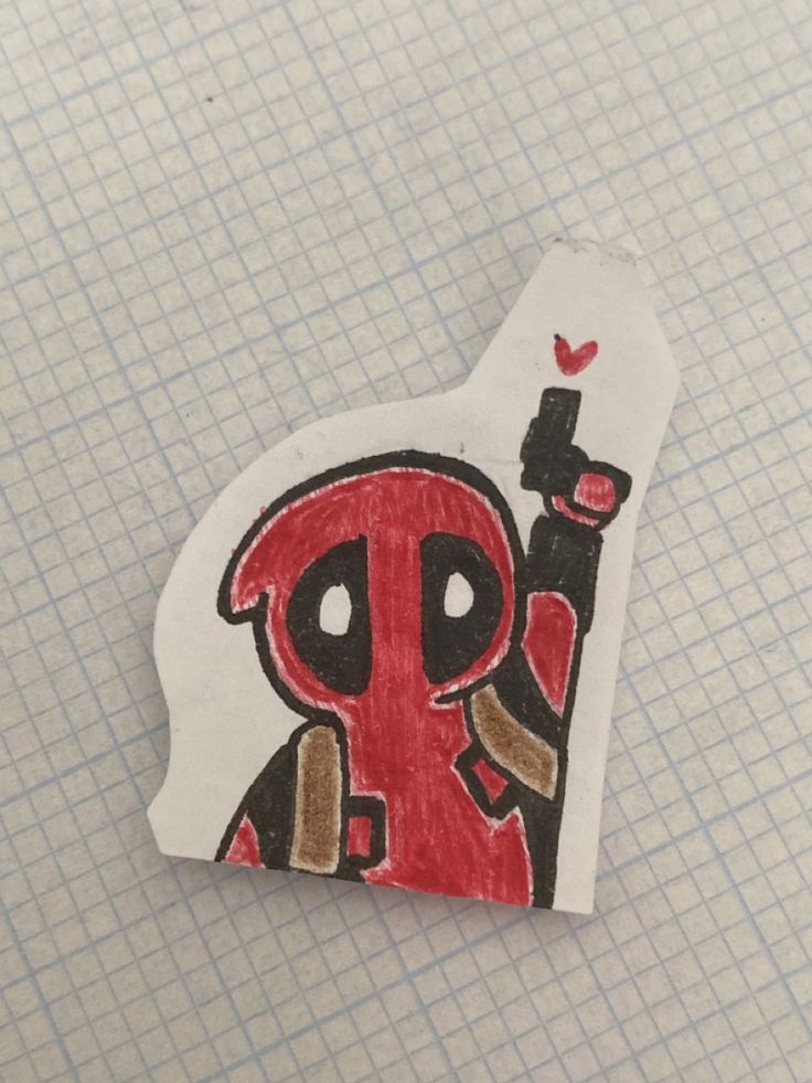 a piece of paper with a drawing of a deadpool on it