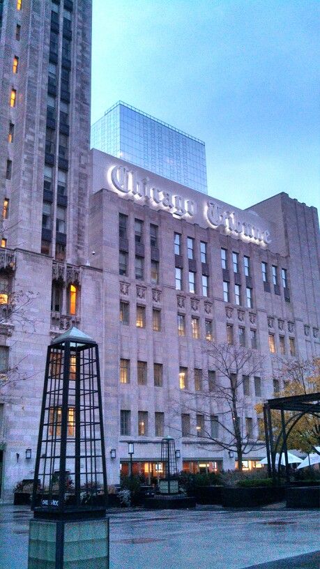 an old building with the words queen elizabeth lit up