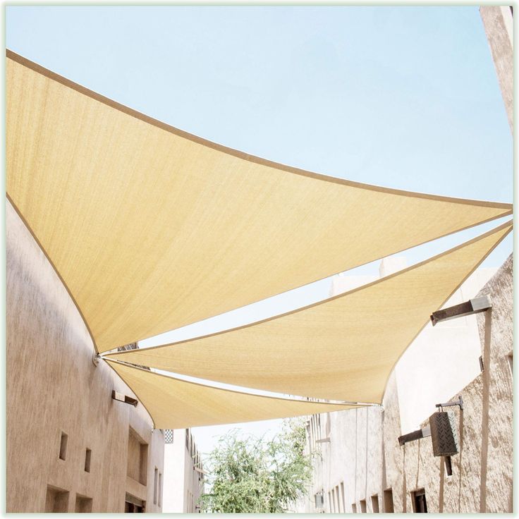 an outdoor area with a yellow shade covering it