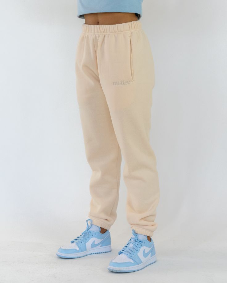 The Naomi Oversized Sweatpants feature a high waist natural fit with an oversized, baggy fit throughout. It’s made from soft brushed fleece with an adjustable interior drawcord at the waistband and elastic hem at the ankle. Soft, comfortable and ultra-cozy. Model is wearing a size Small. Brushed Fleece Fabric Garment dyed, Pre-Shrunk High waisted, Oversized Baggy Interior drawcord detail at waistband Motier Alexandre embroidery on the chest Sizing The Naomi Oversized Sweatpants runs smaller than Drawcord Detail, Oversized Sweatpants, Post Workout, Baggy Fits, Holiday Collection, Fleece Fabric, Oversized Fits, High Waist, Sweatpants