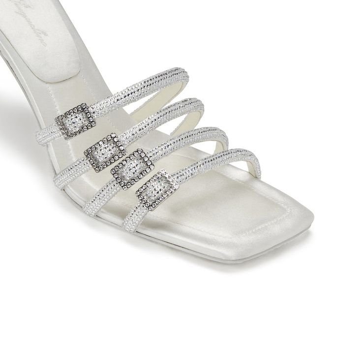 Inject some dazzle to your shoe-drobe with our Shay Sandals. Designed with 4 white straps, each featuring rhinestone details and chic buckles. A wardrobe staple that adds a touch of glamour to every look. Luxury Embellished White Sandals, Nana Jacqueline, White Sandals, Designer Wear, Wardrobe Staples, Final Sale, Sandals, Wardrobe, White