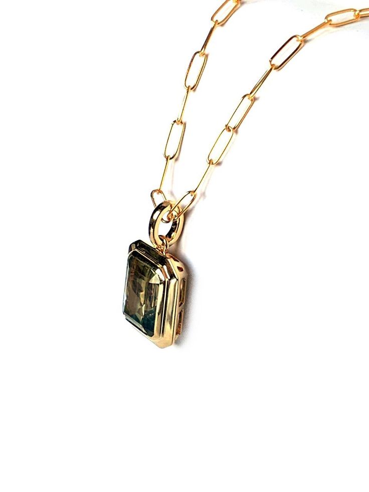 emerald cut green amethyst pendant in 14k gold bezel set j matching earringsME2496GAM and ring MR5056GAM F Also available with other color stones, please inquire d Stone Information: 1 9 X 7 mm emerald cut green amethyst 2.30 cts Gold: white, yellow and rose golds Delivery: one available in 14k yellow gold Green Amethyst Earrings, Amethyst Set, Amethyst Studs, 14k Yellow Gold Necklace, Color Stones, Color Stone, Pink Amethyst, Amethyst Pendant, Amethyst Earrings