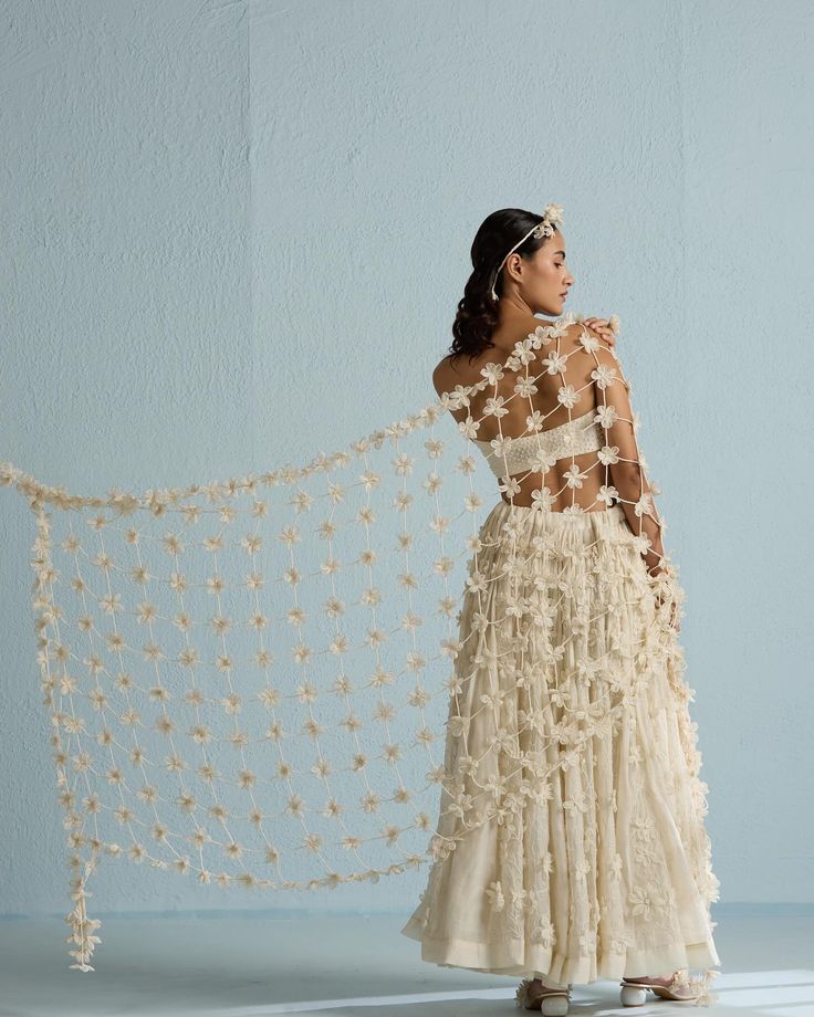 Moon dupatta is inspired by the traditional “phoolon ki chaddar”! Hundreds of white flowers are joined with pearls to create this valence that testifies our love for handmade🫶 Hope you like it as much as we loved making it. www.diariesofnomad.com #flowerdupatta #whiteflowers #diariesofnomad #phoolonkichaadar #handmadeflowers Flower Dupatta For Bride, Flower Dupatta, Photos Recreate, Marriage Design, Backless Blouse Designs, Lehenga Designs Simple, Backless Blouse, Princess Jasmine, Lehenga Designs