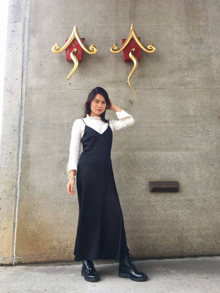 Long Dress With Undershirt, Long Black Dress With Combat Boots, Dress Outfits With Combat Boots, Black Satin Dress With Sweater, Long Winter Dresses With Boots, Long Dress With Shirt Underneath, Black Satin Long Dress, Combat Boots Dress, White Sweater Dress Outfit