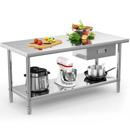 a stainless steel kitchen island with food prep table