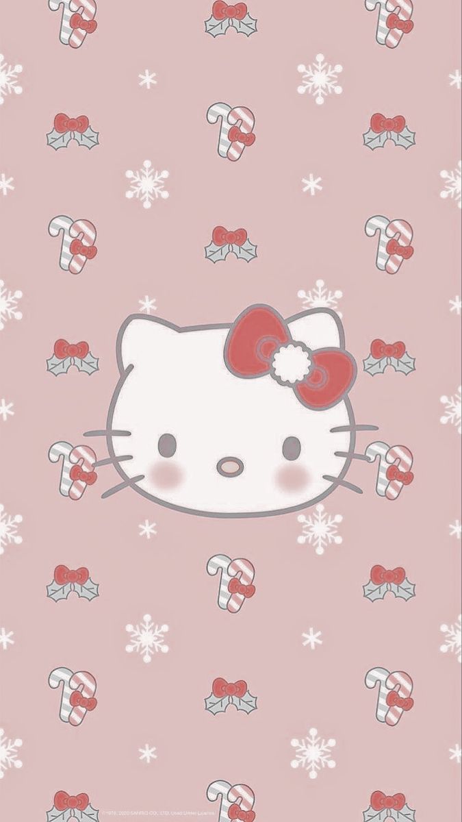 a hello kitty wallpaper with snowflakes and bows on it's head