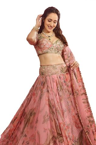 Pink lehenga with all over floral garden prints, elevated with an embroidered broad waistband using sequins, mirror. Paired with a blouse with printed base and sequin, mirror embroidery. Comes along with a dupatta with floral, sequin embroidered buttis. - Aza Fashions Fitted Floral Print Lehenga For Festive Occasions, Festive Floral Print Fitted Lehenga, Fitted Floral Print Choli For Festive Occasions, Festive Fitted Floral Print Lehenga, Festive Fitted Floral Print Choli, Fitted Anarkali Choli With Floral Print, Fitted Georgette Traditional Wear With Floral Print, Fitted Choli With Floral Print And Traditional Drape, Bollywood Floral Print Wedding Lehenga