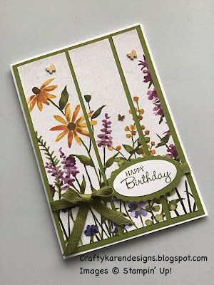 a card with flowers on it and a ribbon around the edge that says happy birthday