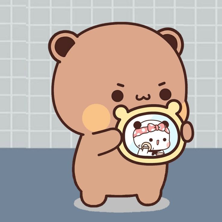 a brown bear holding a mirror with its face in it's hand and looking into the mirror