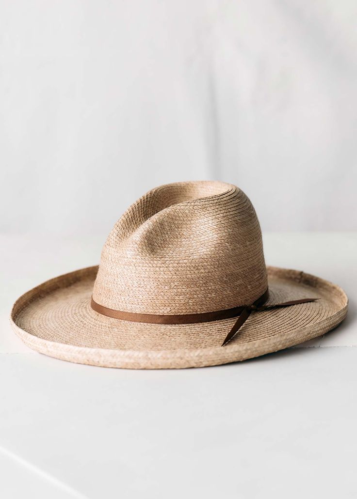 Luxury Fedora Sun Hat For Rodeo, Luxury Toquilla Straw Cowboy Hat With Curved Brim, Luxury Artisan Hats For Rodeo, Luxury Straw Cowboy Hat In Country Style, Luxury Straw Cowboy Hat For Summer, Luxury Casual Toquilla Straw Hat, Affordable Brown Casual Fedora, Luxury Chic Straw Fedora, Luxury Toquilla Straw Country Hat