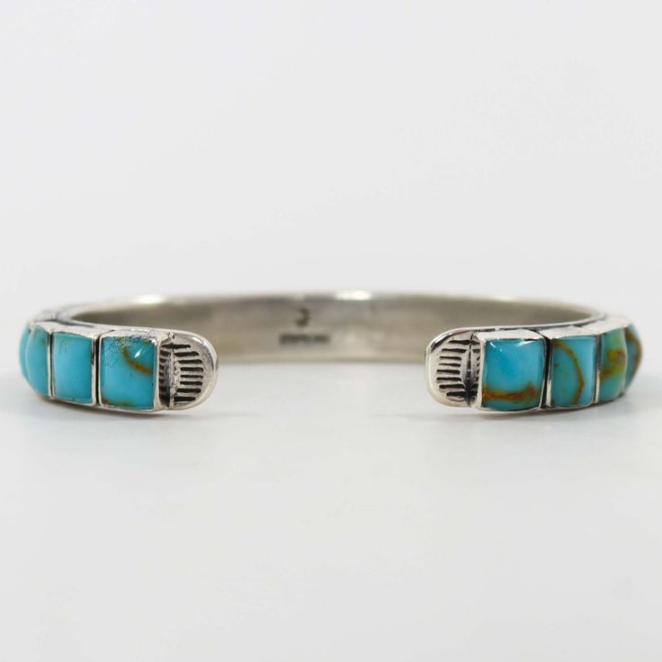 Sterling Silver Cuff Bracelet set with a Row of Turquoise. .25” Cuff Width5.375” Inside Measurement, plus .875” opening(6.25" Total Circumference - Small-Medium) Modern Turquoise Cuff Bracelet For Gift, Turquoise Cuff Bracelet With Polished Finish, Modern Turquoise Cuff Bangle Bracelet, Modern Turquoise Cuff Bangle, Adjustable Turquoise Cuff Bracelet Modern Style, Adjustable Turquoise Modern Cuff Bracelet, Adjustable Turquoise Cuff Bracelet With Polished Finish, Adjustable Turquoise Polished Cuff Bracelet, Adjustable Turquoise Bracelet With Polished Finish