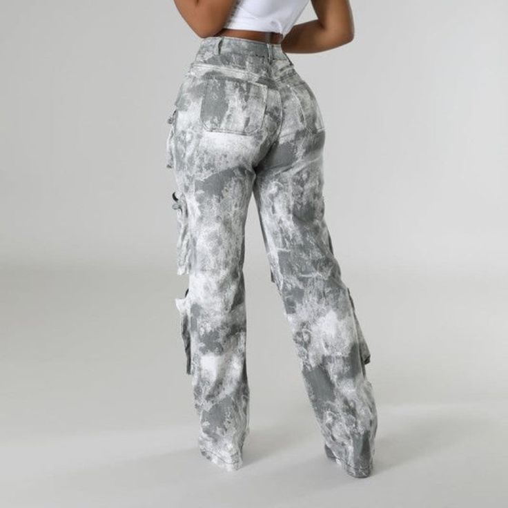 These Revealing Foil Cargo Pants showcase a distinctive washed grey design with oversized pockets that enhance both style and utility. Constructed from resilient fabric, they deliver comfort and adaptability for everyday wear. Material: Crafted from durable, resilient fabric for lasting wear and comfort. Pattern: Features a unique washed grey pattern for a standout look. Pockets: Includes multiple oversized pockets for added functionality and convenience. Design: Versatile design that pairs well Gray Baggy Straight Leg Bottoms, Gray Washed Full-length Bottoms, Acid Wash Casual Bottoms With Side Pockets, Casual Acid Wash Bottoms With Side Pockets, Gray Cotton Utility Cargo Jeans, Gray High Rise Baggy Pants, Spring Gray Cargo Jeans, Trendy Baggy Gray Bottoms, Casual Acid Wash Pants With Pockets