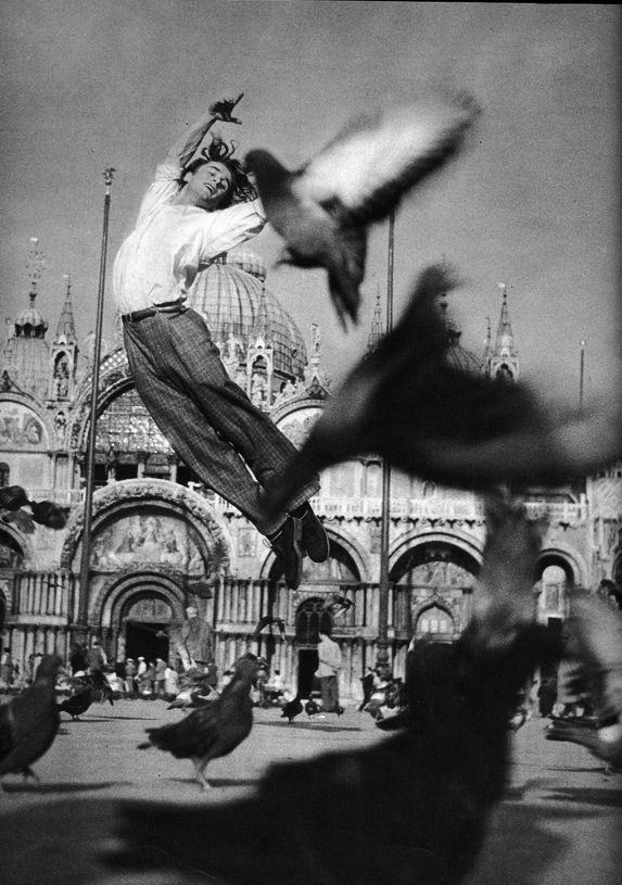 an instagram page with a black and white photo of a man on a skateboard