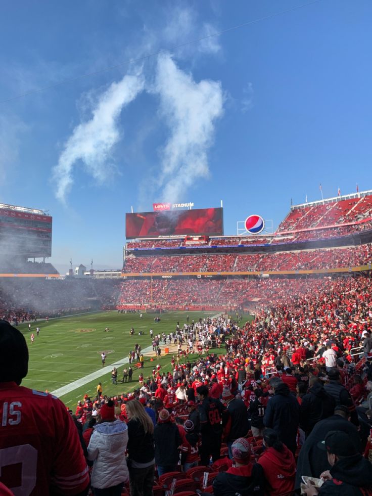 a football stadium filled with lots of people