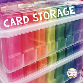 the card storage bins are filled with different colored cards and plastic containers for storing them