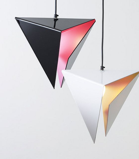 two hanging lights with different shades of red, orange and black on them in the shape of triangulars