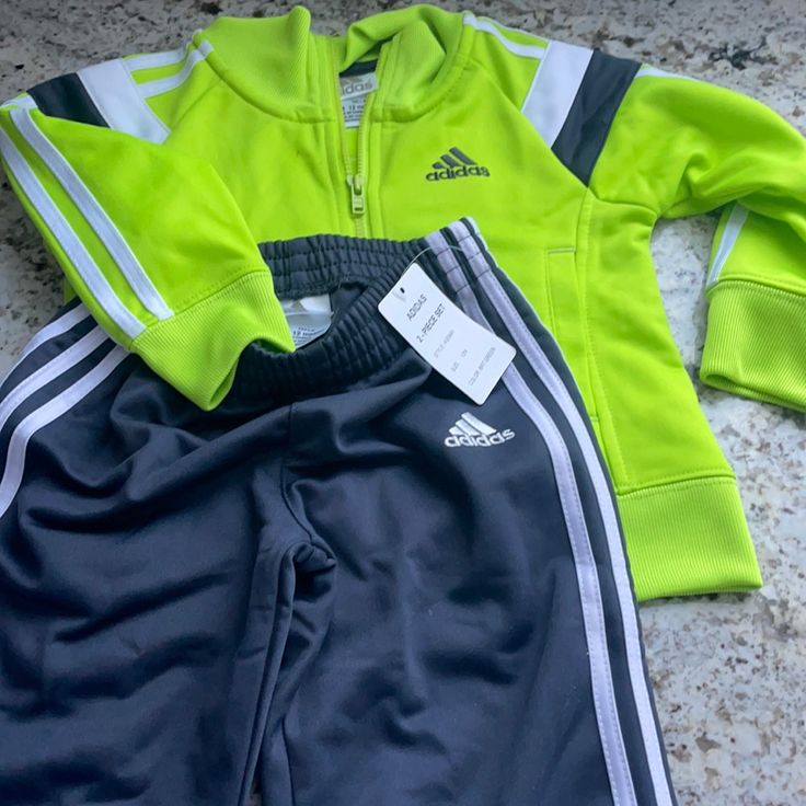 Neon Green Yellow Adidas Track Suit 12 Months Nwt But See Small Pen Marks Otherwise Mint Condition And Adorable And Sheek Adidas Sports Set With Long Sleeve, Adidas Long Sleeve Playwear Sets, Casual Adidas Sets For Spring, Adidas Casual Sportswear Sets, Sporty Long Sleeve Playtime Sets, Adidas Sporty Playwear Sets, Adidas Fitted Playwear Sets, Adidas Fitted Sets For Playwear, Casual Yellow Sets With Long Sleeves