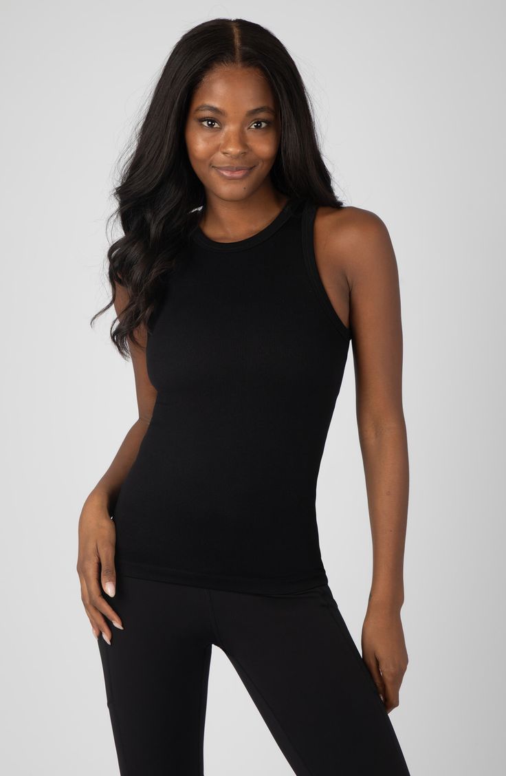 Stock up on essentials with this trio of seamless tank tops crafted from stretchy fabric. Pack of three tank tops Crewneck Sleeveless 92% nylon, 8% spandex Machine wash, tumble dry Imported Black Seamless Tank Activewear, Black Compressive Tank Top For Yoga, Black Compressive Racerback Top, Black Seamless Tank Top For Athleisure, Seamless Black Tank Top For Gym, Black Seamless Tank Top For Gym, Black Seamless Athleisure Tank Top, Versatile Black Tank Top For Yoga, Black Seamless Gym Tank Top