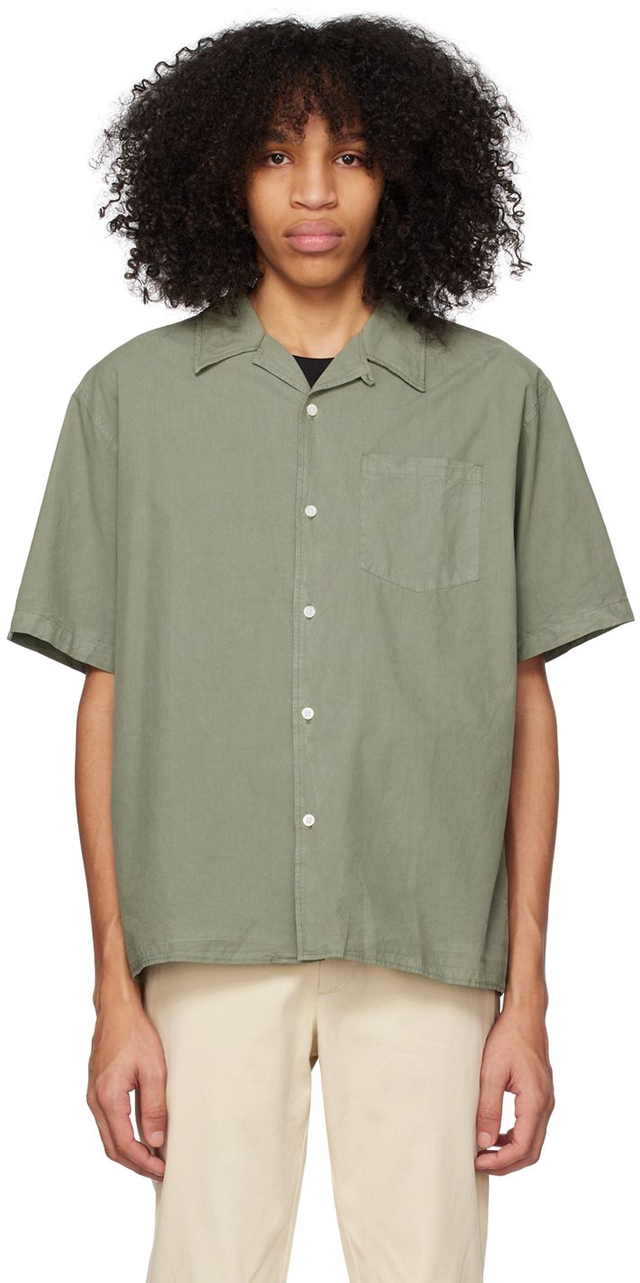 Garment-dyed tencel- and cotton-blend poplin shirt. · Open spread collar · Button closure · Patch pocket · Mother-of-pearl hardware Supplier color: Dried sage green Collared Olive Shirt With Button Closure, Olive Cotton Short Sleeve Shirt, Olive Collared Shirt With Button Closure, Green Unstructured Cotton Shirt, Unstructured Green Cotton Shirt, Green Button-up Camp Shirt With Pockets, Olive Cotton Summer Shirt, Summer Olive Cotton Shirt, Khaki Relaxed Fit Short Sleeve Button-up Shirt