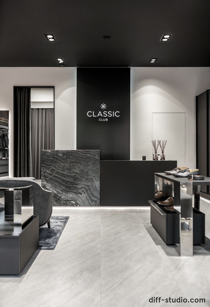 a black and white store with marble counter tops