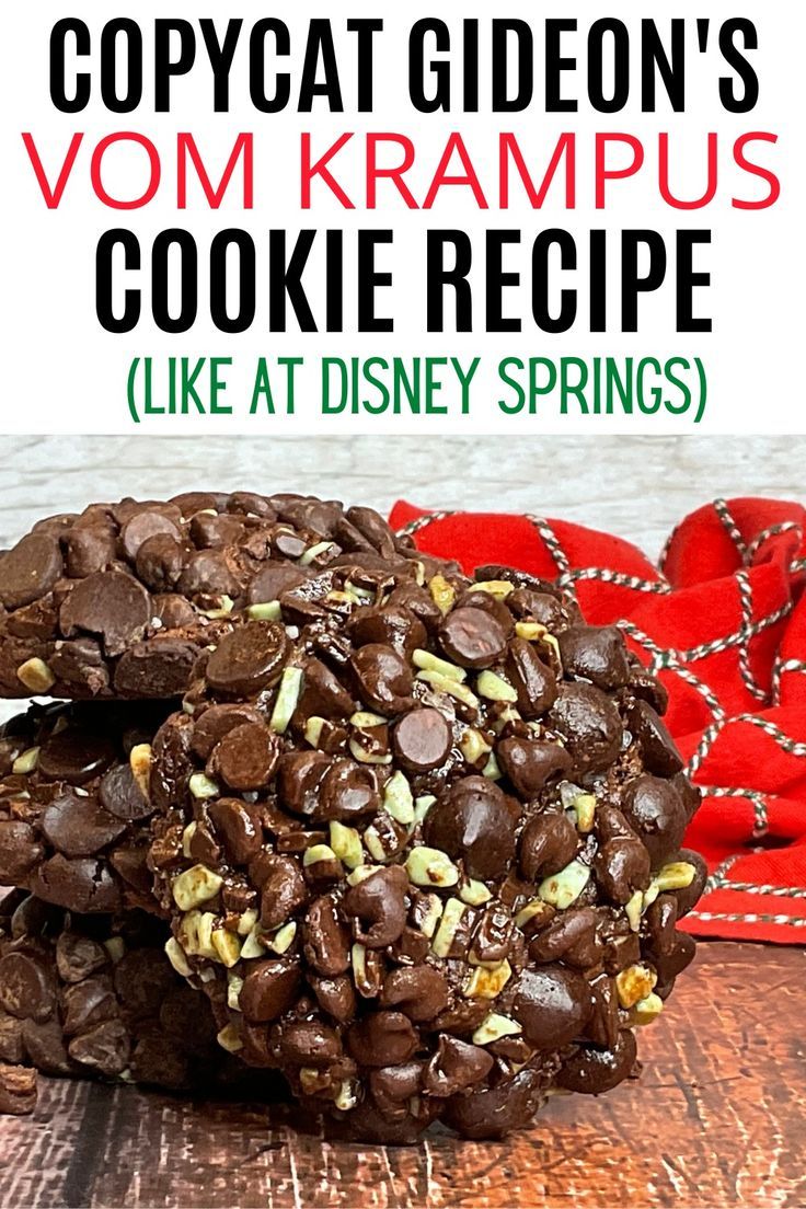 two chocolate cookies stacked on top of each other with text overlay that reads copycat giden's vom kramus cookie recipe like at disney springs