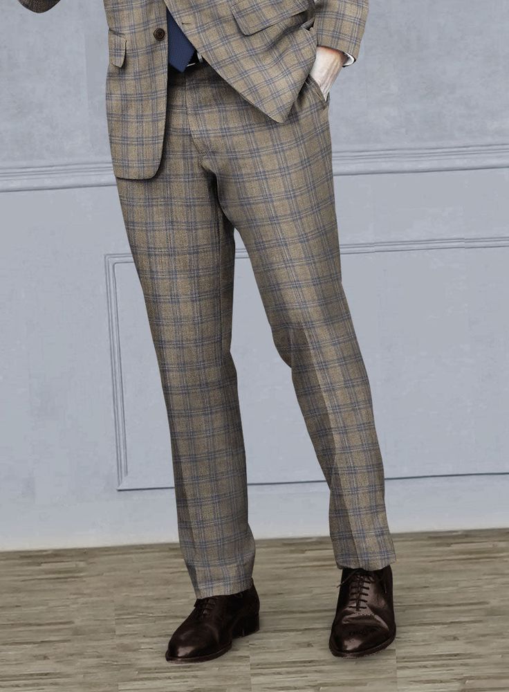 Seal your formal look with a suave piece like our Reda Sand Brown Checks Wool Suit. Tailored using superior-quality wool material, this suit is a must-have addition to your esteemed collection. The overcheck pattern, featuring blue yarns on a calm brown tone, reflects an updated vision of luxury tailoring. For men who wish to dress in a more upscale manner, this suit is a perfect choice. 
 
 Look Includes   Reda     Sand     Brown     Checks     Wool  Fabric  Two Button Jacket Style  Notch Lapel Grey Tweed Suit, Herringbone Tweed Jacket, White Linen Suit, Green Velvet Jacket, Peaky Blinders Suit, Royal Blue Suit, Pants Tailored, Fabric Cross, Blue Chinos