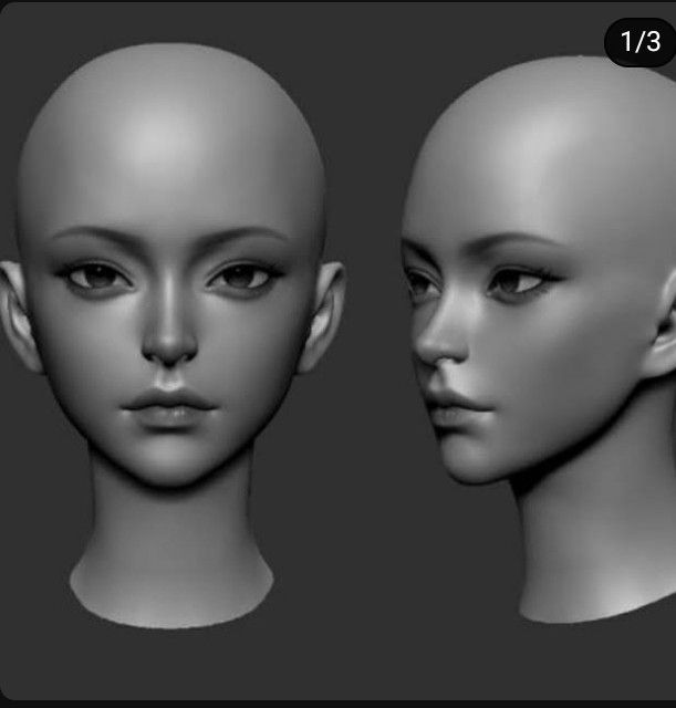 three different views of the head of an alien woman