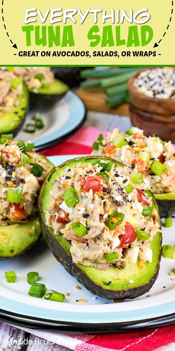 stuffed avocados filled with tuna salad on a plate