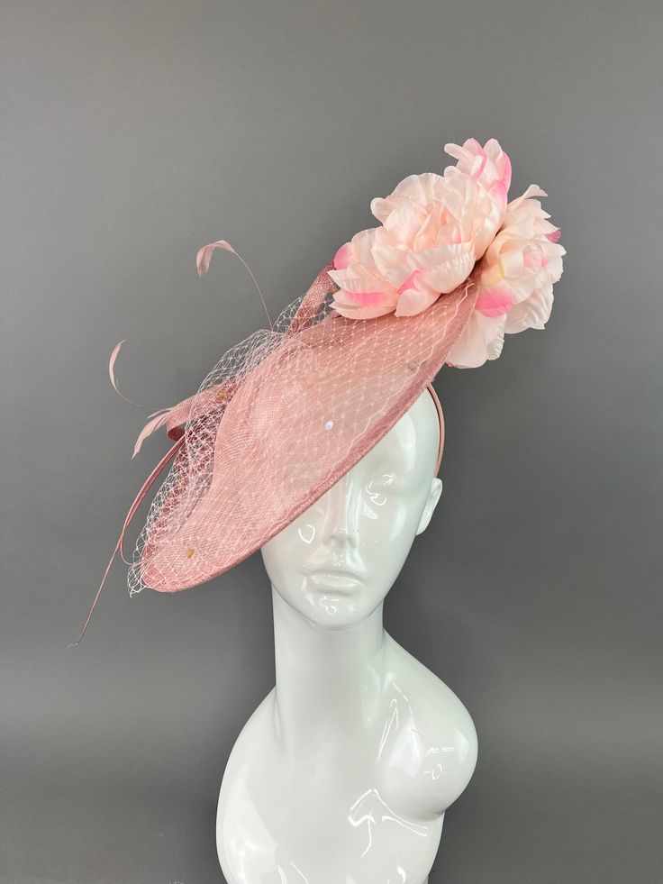 Blush pink sinamay fascinator adorned with two shades of pink blooms. made to be worn on the right side. Fascinators are one size fits all. All Sales are final. don’t forget to follow us on instagram @TheHatHive Adjustable Pink Headpiece With Handmade Flowers, Pink Adjustable Headpieces With Handmade Flowers, Pink Flower Headpiece For Kentucky Derby, Pink Adjustable Fascinator For Formal Occasions, Adjustable Pink Flower Fascinator, Pink Mini Hat With Handmade Flowers, Pink Headpieces With Handmade Flowers For Royal Ascot, Adjustable Pink Flower Headpiece, Pink Handmade Flower Headpieces For Royal Ascot