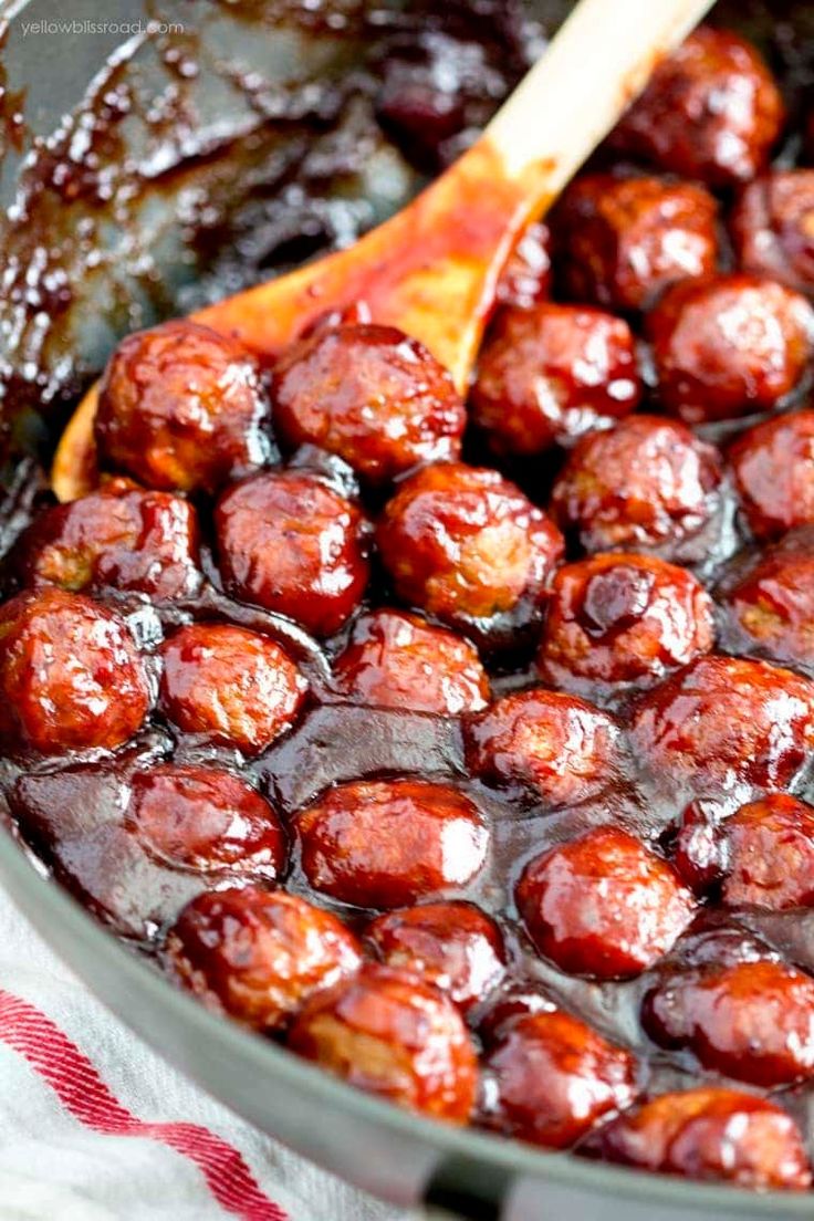 a close up of a pan filled with meatballs