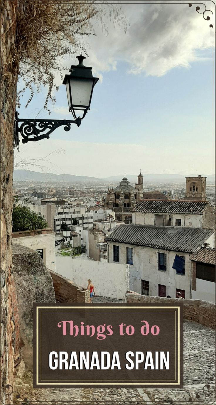 an old street light with the words things to do in granada spain