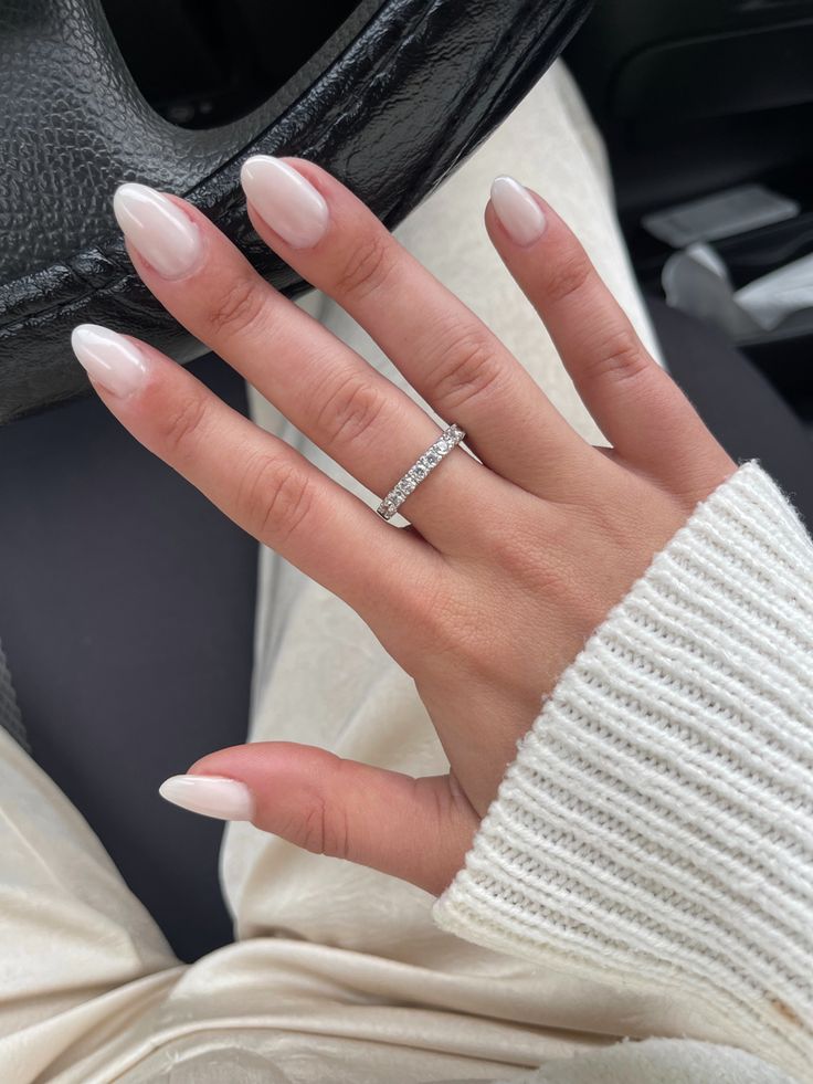 Almond white nails Almond Soft White French, Bubbly White Nails, White Nails With Designs Short Almond, Almond White Milk Nails, Pearl White Oval Nails, Almond Off White Nails, Light White Almond Nails, Off White Short Almond Nails, Basic Nails Almond Short