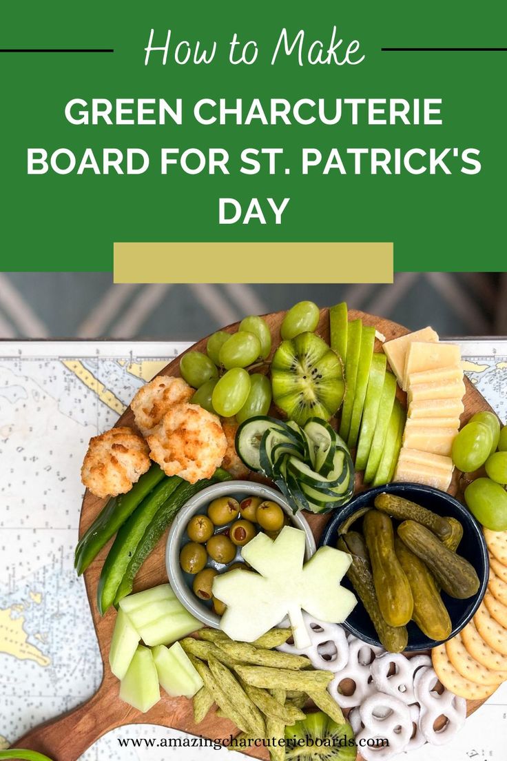 a wooden platter filled with cheese, olives and pickles on top of a table