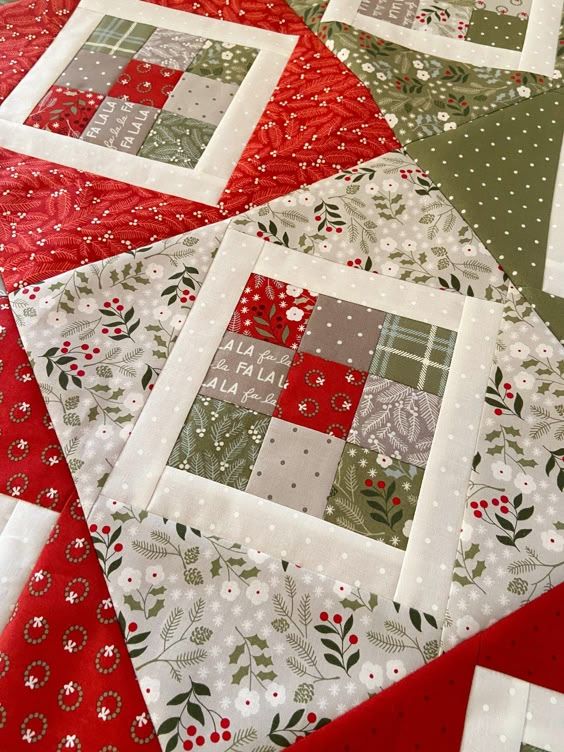 the quilts are all different colors and patterns on the table topper, but they have been stitched together