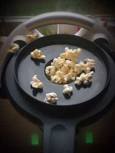 the popcorn is being cooked on the grill