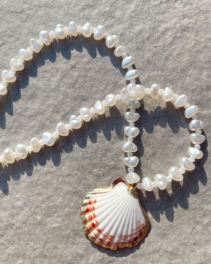 Shell & pearl necklace. One size fits all - 20 inches. Handle with care, avoid wearing in water. Handle With Care, Shell Necklace, Shell Necklaces, In Water, Pendant Necklaces, One Size Fits All, Favorite Jewelry, Necklace Etsy, Jewelry Necklace Pendant