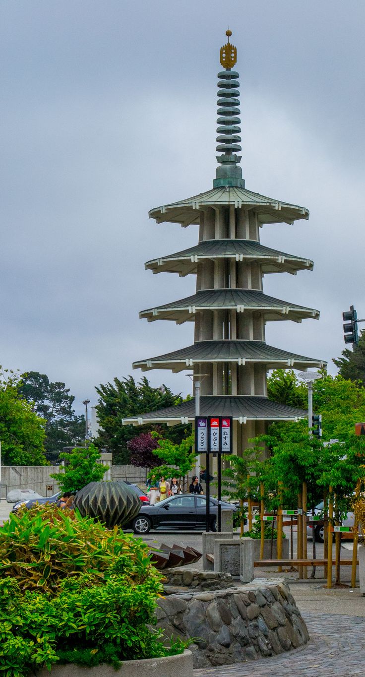 a very tall tower that is in the middle of a park