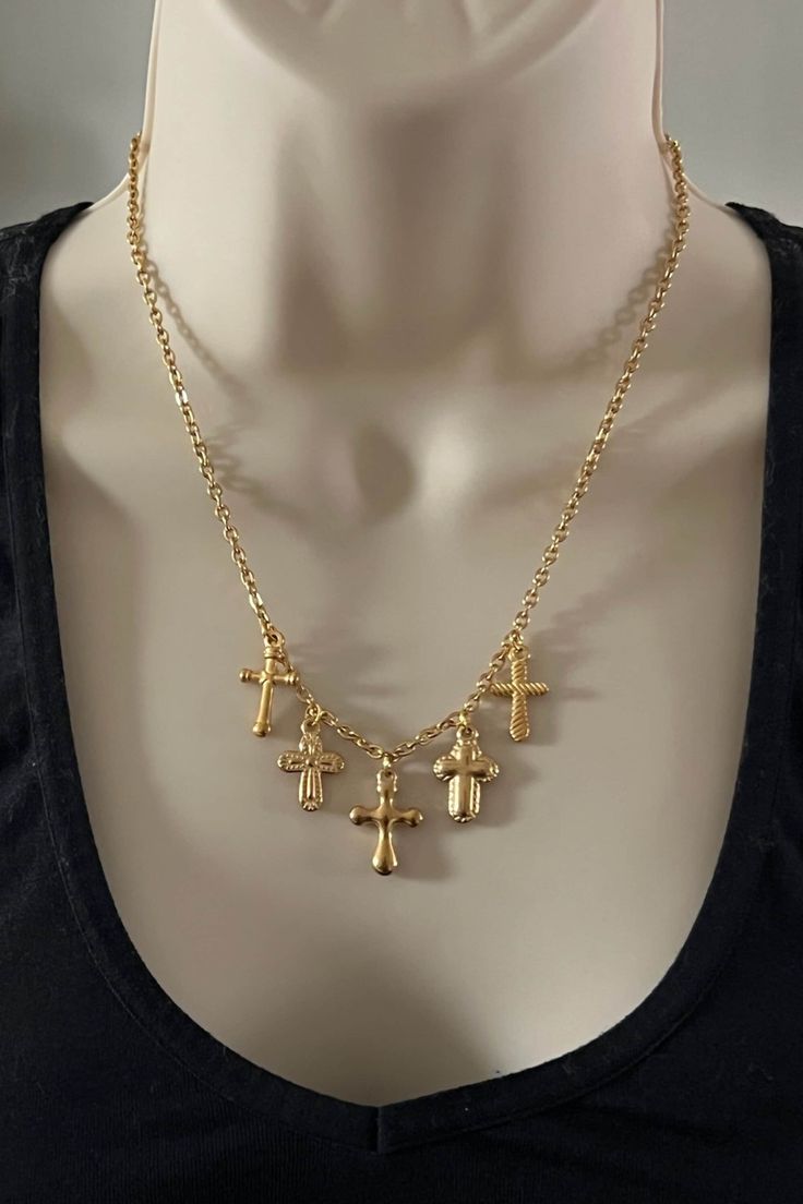 Cross necklace for her with multi cross charms necklace gold crosses necklace religious jewelry golden tiny cross pendant protection jewelry Elevate your style with our stainless steel Multiple Cross Charm Necklace. Crafted in a sleek gold color, this necklace features multiple cross charms for a trendy and fashionable look. Made with high-quality materials, it's durable and long-lasting. Perfect for any outfit, it's a must-have accessory for any fashion-forward individual. Item Details: *Stone: Crosses Necklace, Cross Charm Necklace, Protection Jewelry, Tiny Cross, Charms Necklace, Necklace For Her, Gold Cross Necklace, Gold Charm Necklace, Jewelry Outfit