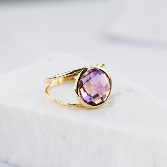 Purple Amethyst double ring in 14K solid gold. A statement ring with a natural amethyst gemstone. A perfect gold ring for women, dainty and subtle that adds glam to every outfit. The best Valentine's Day gift. 100% handcrafted with love!D E T A I L S● Metal: 14K solid gold, 14K white gold or 14K rose gold● Gemstone: Purple Amethyst, briolette cut● Stone Diameter: 10mm (0.4in)  and 12mm (0.5in)R I N G ∙ S I Z I N GFor General Reference:● we use standard US Ring Sizing● an average women's ring fin Gold Amethyst Solitaire Ring, Gold Solitaire Amethyst Ring, Modern Amethyst Ring In Yellow Gold, Gold Amethyst Open Ring Fine Jewelry, Gold Faceted Amethyst Ring, Modern Gold Amethyst Gemstone Ring, Gold Amethyst Ring In 14k Gold, Fine Jewelry Amethyst Gold Ring, Fine Jewelry Gold Amethyst Ring